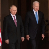 U.S. President Joe Biden (right) and Russia\'s President Vladimir Putin arrive for the U.S.-Russia summit at Villa La Grange in Geneva, Switzerland, on June 16, 2021. | REUTERS