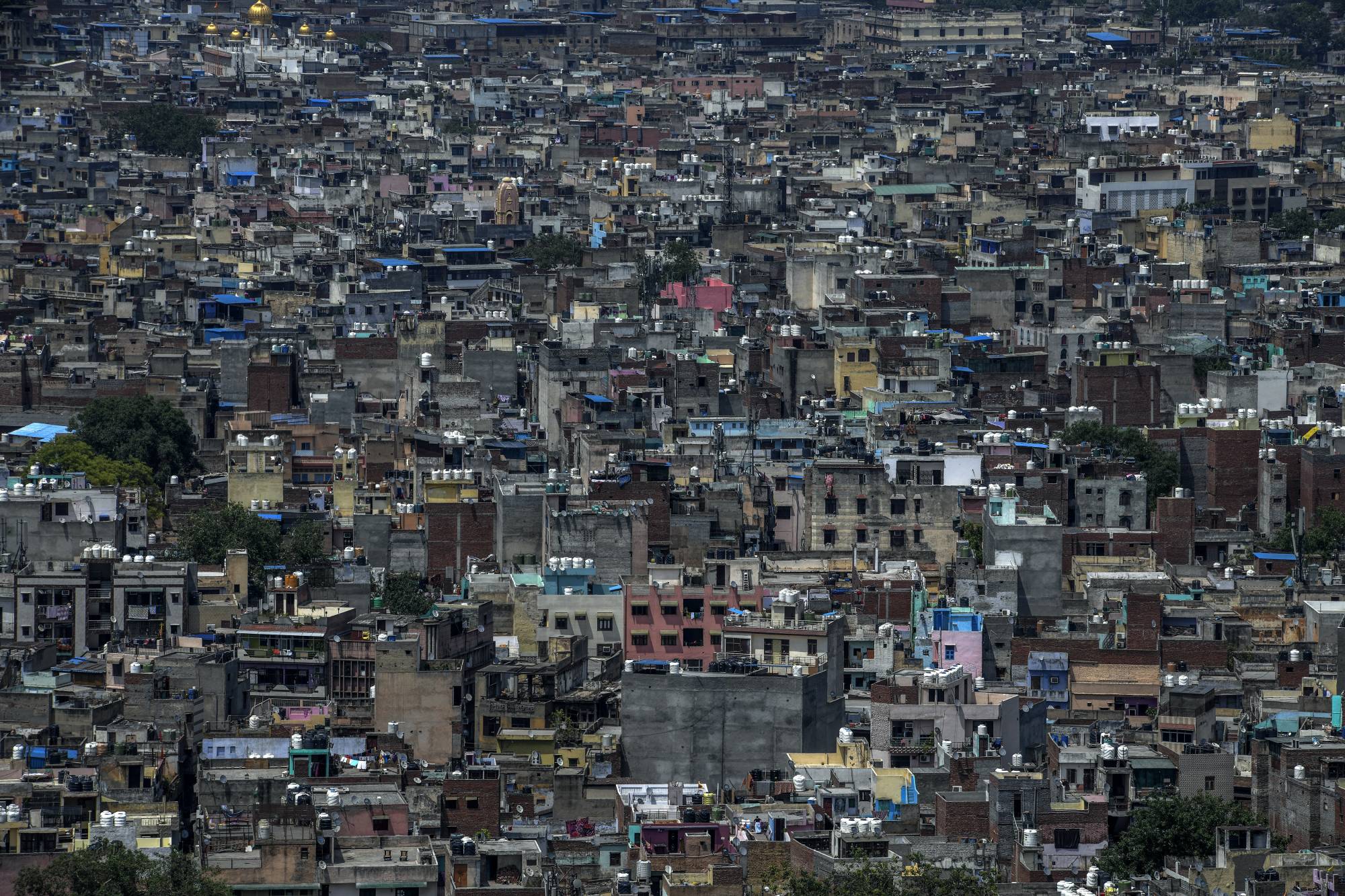 The tangle of cities and districts around Delhi is so sprawling that no canonical count of its population exists; estimates range from 30 million to 60 million. | ATUL LOKE / THE NEW YORK TIMES