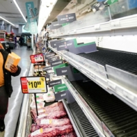A beef display case is seen nearly empty at a grocery store as the U.S. continues to experience supply chain disruptions.  | REUTERS