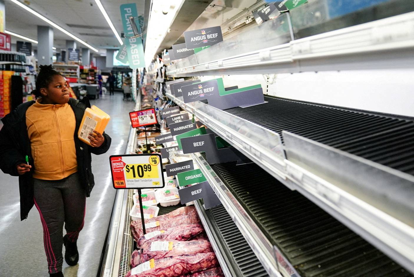 A beef display case is seen nearly empty at a grocery store as the U.S. continues to experience supply chain disruptions.  | REUTERS