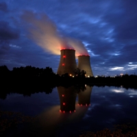 Steam rises from cooling towers of the Electricite de France (EDF) nuclear power plant in Belleville-sur-Loire, France, on Oct. 12. | REUTERS
