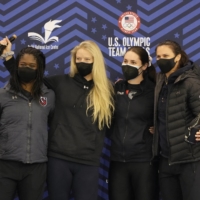 Erin Jackson, Mia Kilburg-Manganello, Kimi Goetz and Brittany Bowe celebrate on the podium after being nominated for 2022 U.S on Jan. 9. | PATRICK MCDERMOTT / USA TODAY / VIA REUTERS