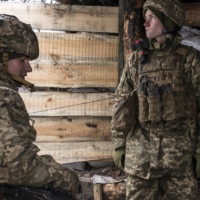 Ukrainian soldiers in a trench on the front line in Popasna, Ukraine, on Monday. Fears of a Russian invasion of Ukraine are growing, but there are still diplomatic options, with the U.S. and NATO expected to respond in the next several days to Russian President Vladimir Putin\'s demands. | BRENDAN HOFFMAN / THE NEW YORK TIMES