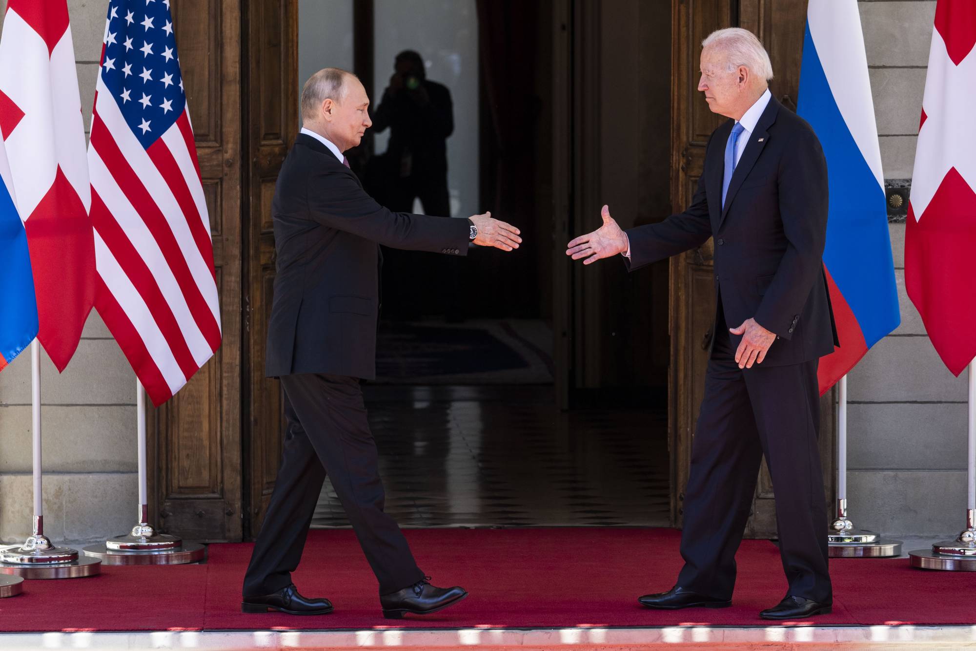 U.S. President Joe Biden and Russian President Vladimir Putin greet one another during a summit in Geneva, Switzerland, in June. | Doug Mills / The New York Times