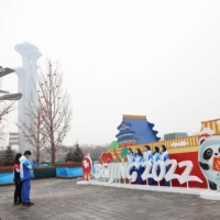 Smoggy skies in Beijing on Monday. China is hoping to use the Winter Olympics to demonstrate its commitment to fighting climate change. | BLOOMBERG 