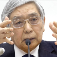 Bank of Japan Gov. Haruhiko Kuroda speaks during a news conference at the central bank\'s headquarters in Tokyo on Jan. 18. | BLOOMBERG