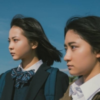 A high school student (Yuzumi Shintani, left) develops an infatuation with her enigmatic classmate (Marin Hidaka, right) in Akihiko Shiota’s “The World of You.” | © SHIMAFILMS
