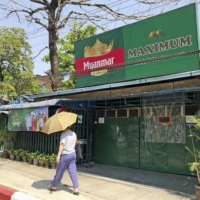 A boycott of products made by military-linked companies, including Myanmar Beer, was staged in protest against the Feb. 1 coup in Myanmar. Kirin Holdings said its experiences with the brewer would not discourage it from business in Myanmar. | KYODO
