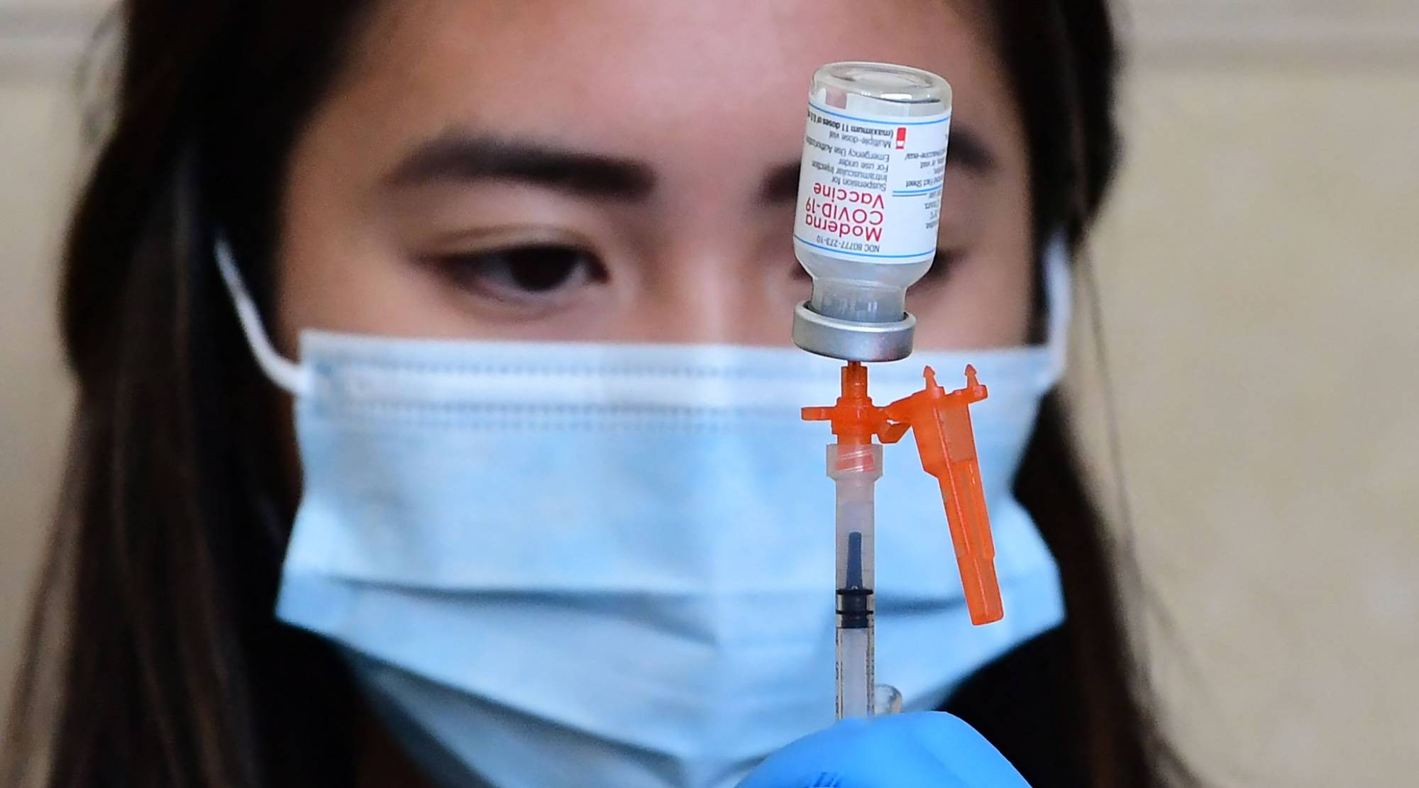 The Moderna COVID-19 vaccine is prepared for administration at a site in Los Angeles on Jan. 7. | AFP-JIJI