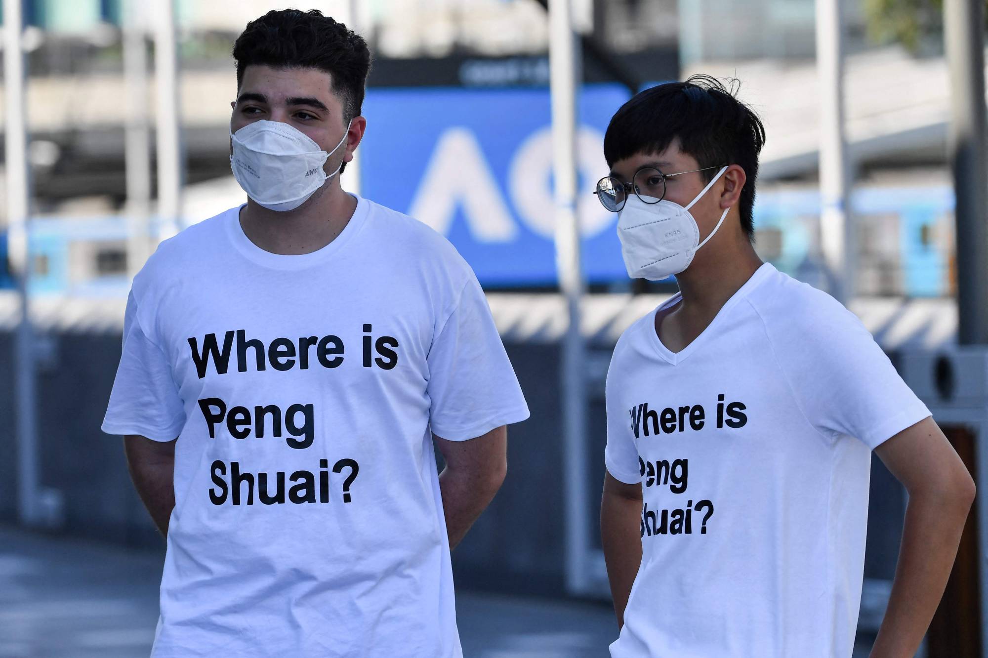 Spectators wear shirts bearing the message 'Where is Peng Shuai,' outside of Melbourne Park during the Australian Open in Melbourne on Jan. 25. | AFP-JIJI
