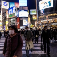People walk in Tokyo\'s Shibuya district in January. | AFP-JIJI