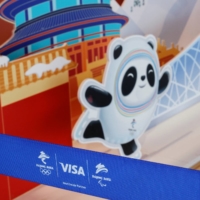 The logo of Olympics sponsor Visa at a souvenir shop at the main press center for the Beijing Olympics | REUTERS