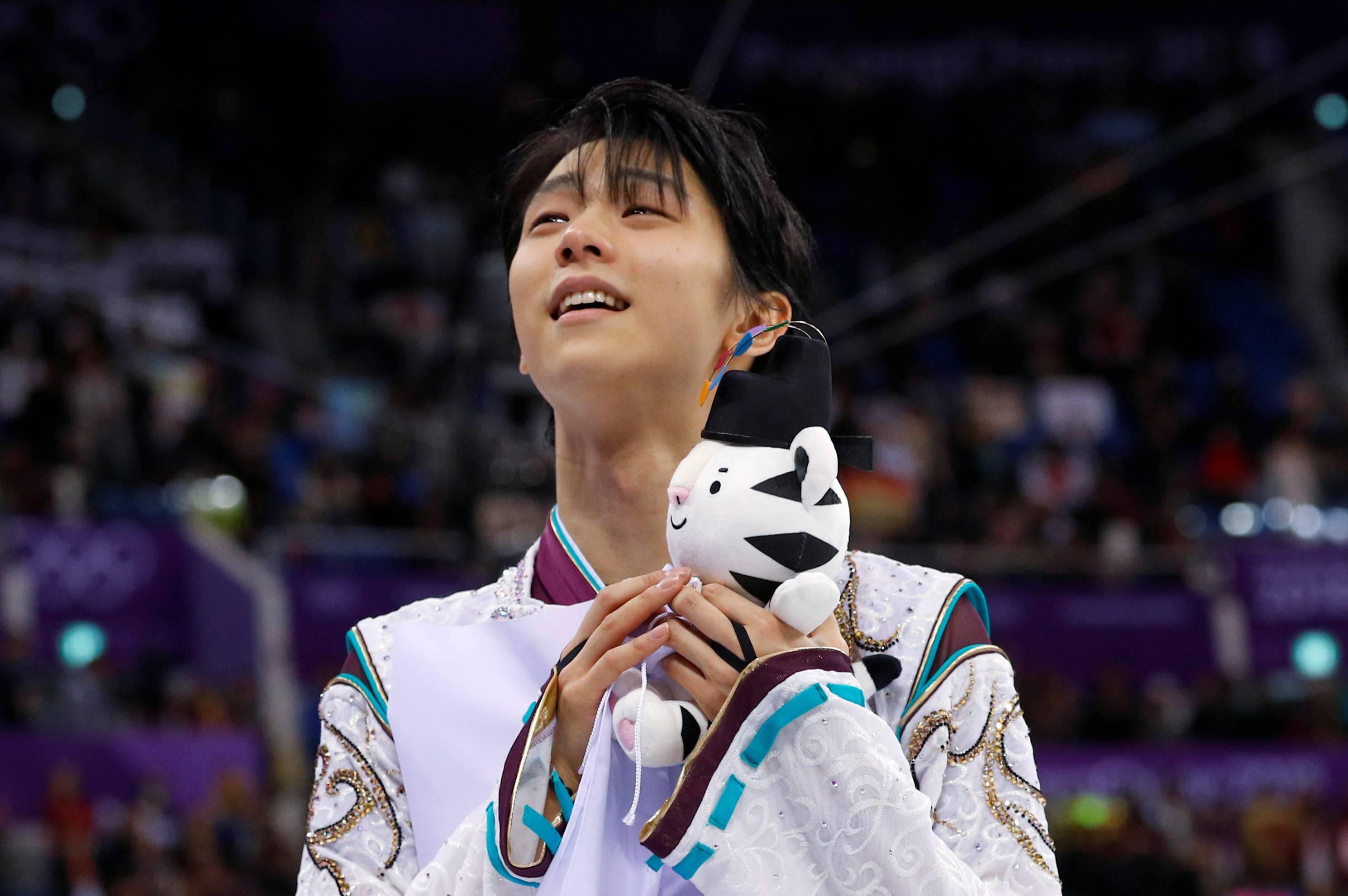 Japan's Yuzuru Hanyu celebrates after winning the gold medal in men's figure skating at the Pyeongchang Winter Olympics in 2018 | PHIL NOBLE / REUTERS