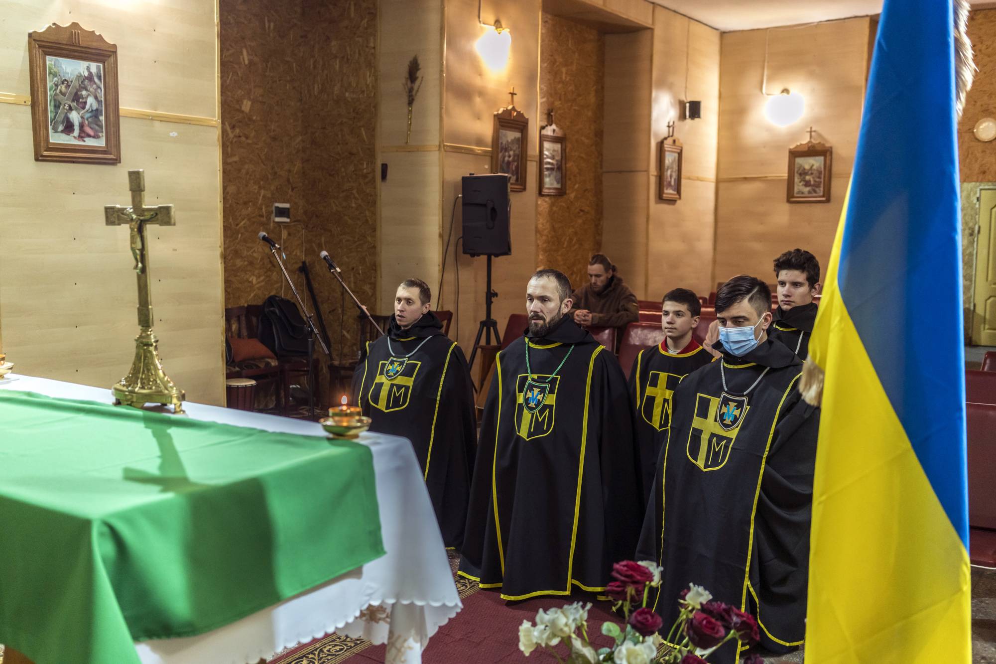 A Roman Catholic prayer service for peace in Pionerske, Ukraine, on Friday, Jan. 28. | Brendan Hoffman / The New York Times