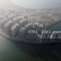 Thirty-nine buildings developed by China Evergrande Group that authorities have issued demolition orders for, on the man-made Ocean Flower Island in Danzhou, Hainan province, China, on Jan. 7 | REUTERS