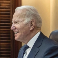 U.S. President Joe Biden speaks with Prime Minister Fumio Kishida from the White House in Washington during a virtual summit on Jan. 21. | AP / VIA KYODO