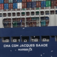 A shipping container departs from Le Havre, France, on Jan. 21.  | AFP-JIJI