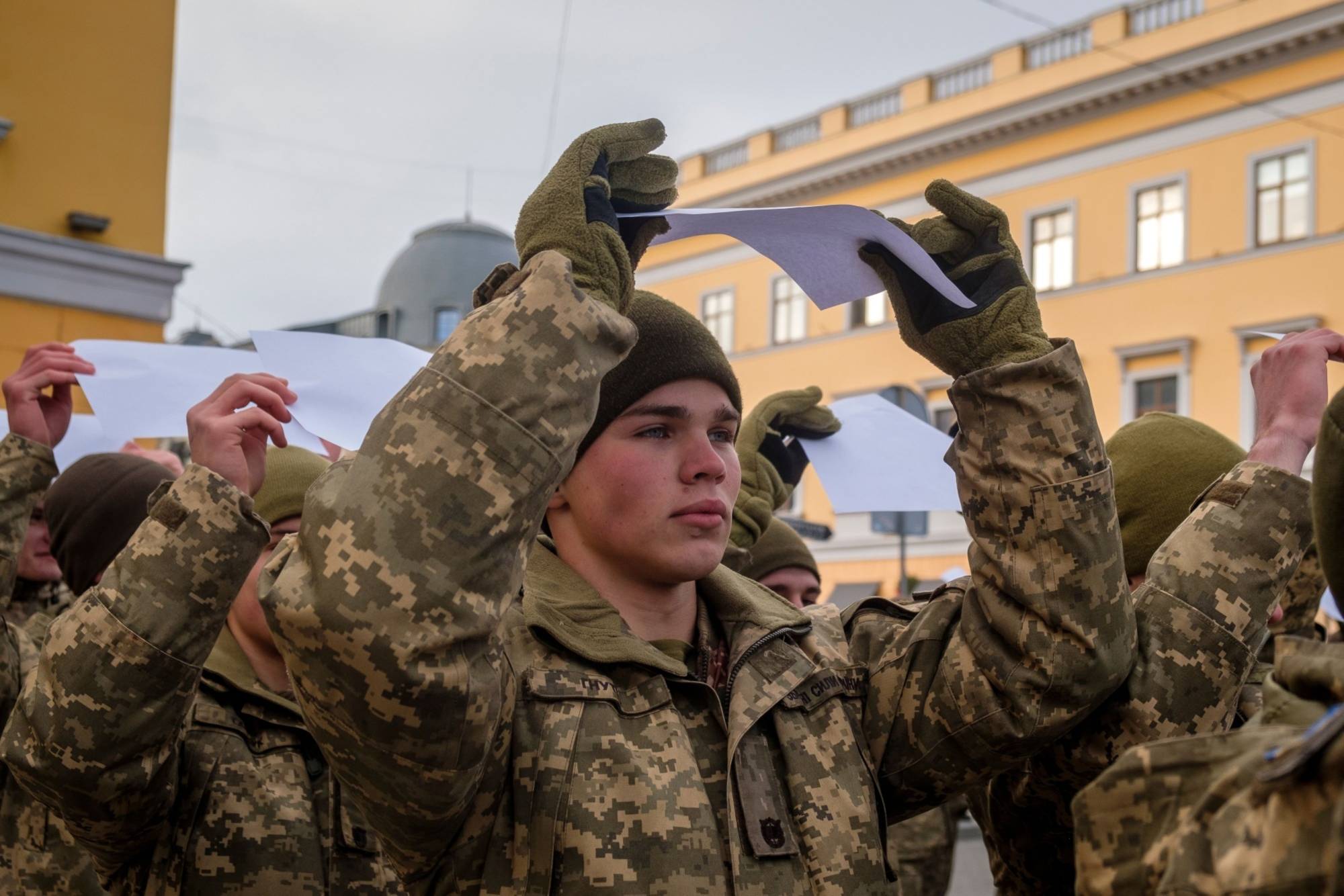 Ukrainian soldiers attend a rally in Odessa, Ukraine, on Jan. 22. | BLOOMBERG 