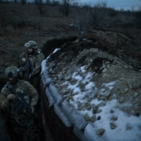 Ukrainian soldiers on the front lines near Trokhizbenka in eastern Ukraine on Wednesday | TYLER HICKS / THE NEW YORK TIMES