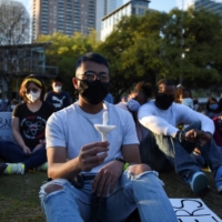 People protest against violence targeting Asian American people, in Houston, in March 2021.  | REUTERS