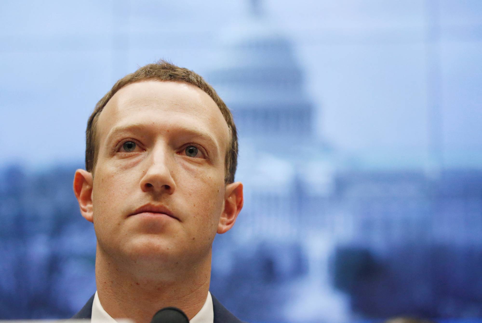 Meta Platforms CEO Mark Zuckerberg testifies before a House Energy and Commerce Committee hearing regarding the company's use and protection of user data on Capitol Hill in Washington in April 2018. | Reuters