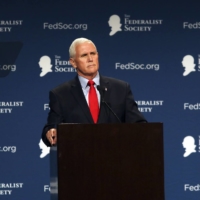 Former U.S. Vice President Mike Pence speaks at the Federalist Society in Lake Buena Vista, Florida, on Friday. Pence said in a speech that he had no right to overturn the 2020 election, as former President Donald Trump has falsely claimed.  | JACOB LANGSTON/THE NEW YORK TIMES
