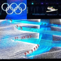 Dancers perform during the opening ceremony of the 2022 Beijing Olympics on Friday.  | CHANG W. LEE / THE NEW YORK TIMES