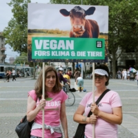 Vegan activists protest against the exploitation of animals and climate change in Zurich in August 2019. | REUTERS 
