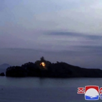 An image released by North Korea\'s official Korean Central News Agency on Jan. 28 shows the impact on Alsom Island by what North Korea says was a long-range cruise missile test-fire. | KNS / KCNA / VIA AFP-JIJI