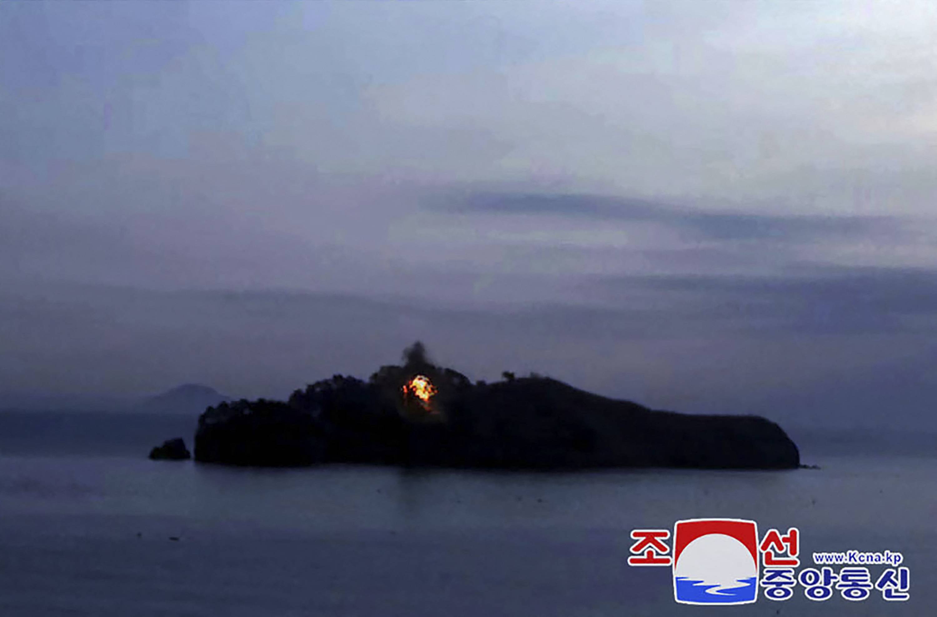 An image released by North Korea's official Korean Central News Agency on Jan. 28 shows the impact on Alsom Island by what North Korea says was a long-range cruise missile test-fire. | KNS / KCNA / VIA AFP-JIJI