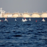 A liquefied natural gas (LNG) tanker floats off the coast of Futtsu, east of Tokyo, in Nov., 2017. | REUTERS