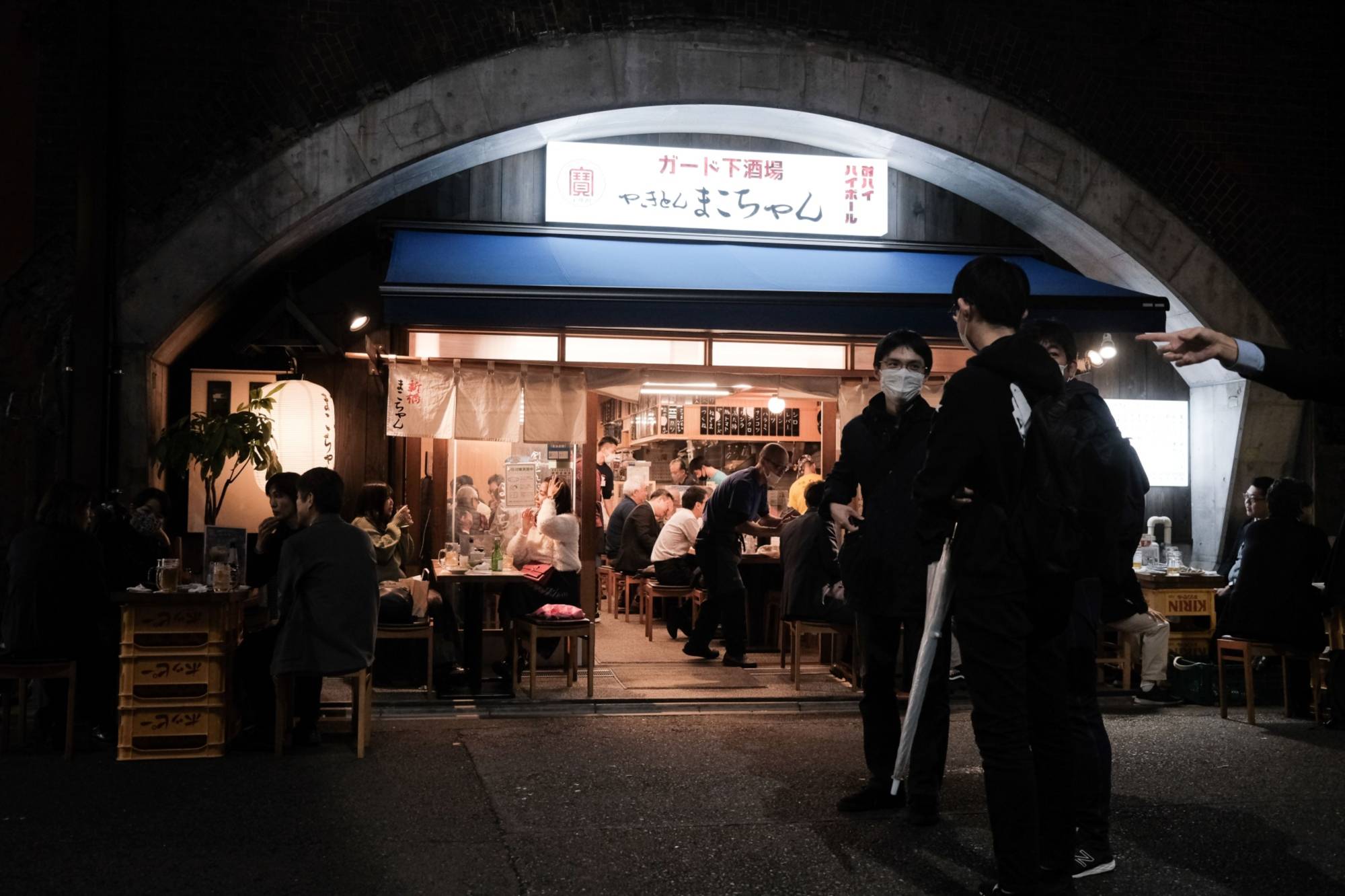Social practices in Japan that often encourage both camaraderie and peer pressure — after-work drinking parties, for example — have largely taken a back seat amid the pandemic. | Soichiro Koriyama / Bloomberg