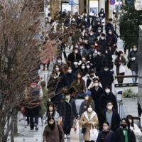 Tokyo confirmed 12,211 new cases of COVID-19 on Monday. | KYODO
