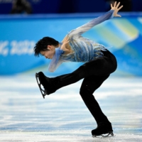Japan\'s Yuzuru Hanyu competes in the men\'s single skating short program of the figure skating event during the Beijing 2022 Winter Olympic Games at the Capital Indoor Stadium on Tuesday. | AFP-JIJI