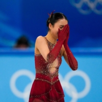 Beverly Zhu, an American-born figure skater who competes for China under the name Zhu Yi, finished her routine in tears on Monday.  | GABRIELA BHASKAR / THE NEW YORK TIMES