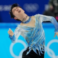 Yuzuru Hanyu of Japan competes in the short program portion of the men\'s single skating event at the 2022 Winter Olympics in Beijing on Tuesday. | CHANG W. LEE /  THE NEW YORK TIMES