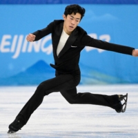American Nathan Chen competes in the men\'s single skating short program of the figure skating event during the 2022 Winter Olympic Games at the Capital Indoor Stadium in Beijing on Tuesday. | AFP-JIJI