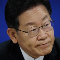 Lee Jae-myung, the upcoming 2022 presidential election candidate of the ruling Democratic Party, during an interview with foreign media in Seoul on Dec. 29.  | REUTERS