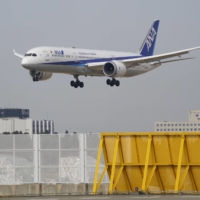 An All Nippon Airways Co. (ANA) aircraft landing at Narita Airport near Tokyo in March, 2021. | BLOOMBERG