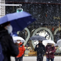 Snowfall in Tokyo\'s Ginza district last Thursday | KYODO