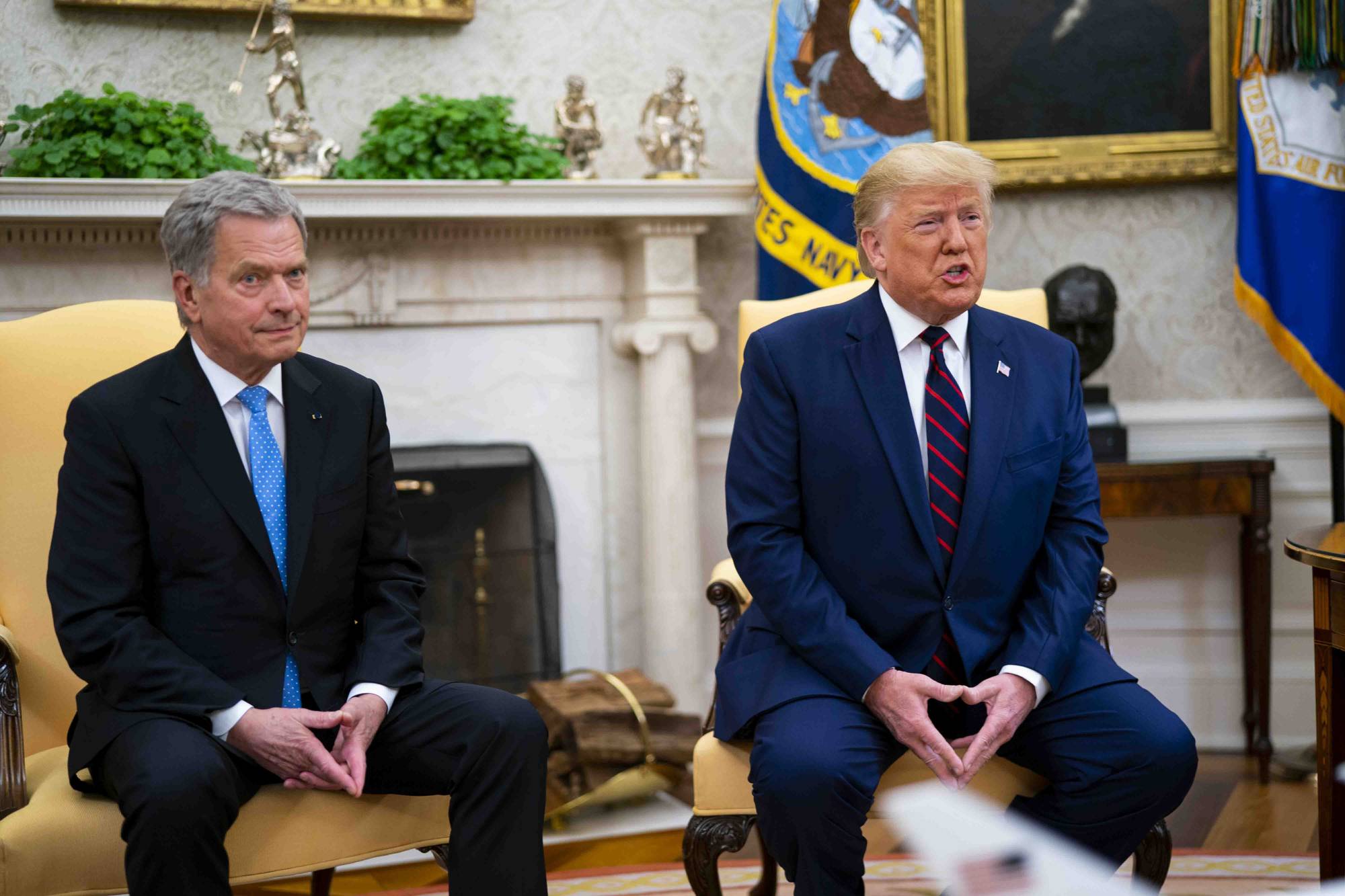 Finland President Sauli Niinisto meets with then-U.S. leader Donald Trump in the Oval Office of the White House in Washington in October 2019. | Doug Mills/The New York Times