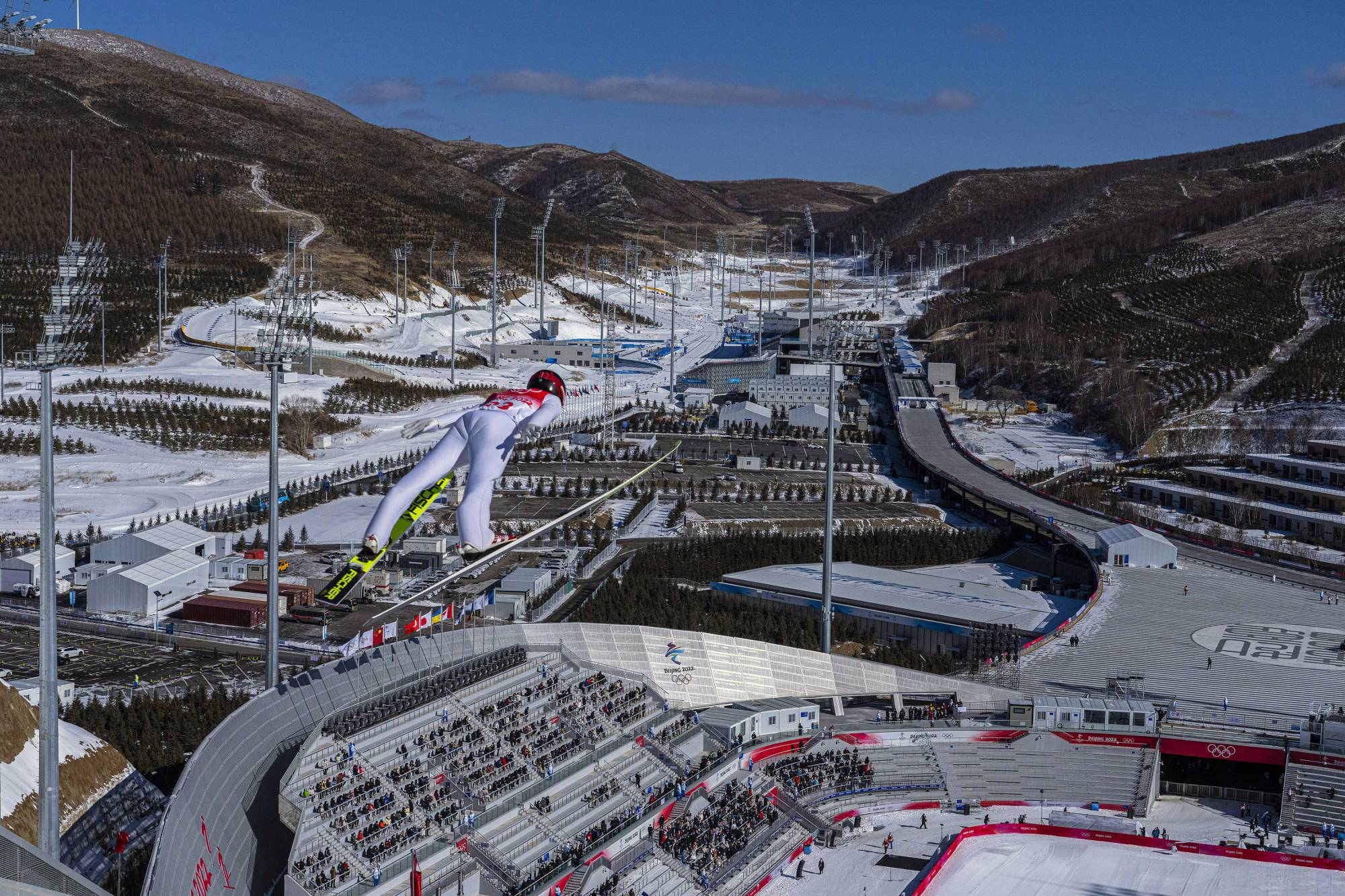 The Zhangjiakou National Ski Jumping Center for the 2022 Winter Olympics. Beijing hopes the Games will nurture interest in skiing and other winter sports that could boost consumer spending. | Hiroko Masuike / The New York Times