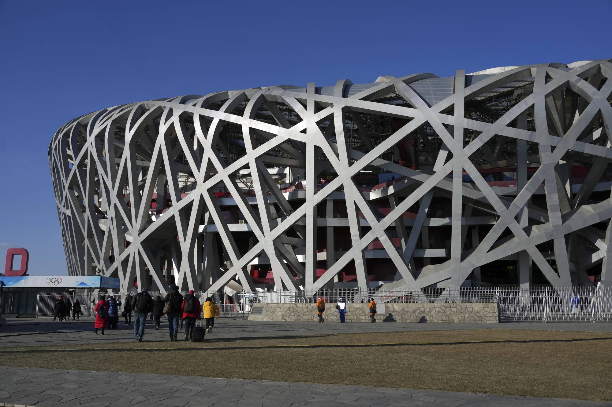 The National Stadium, also known as the Bird’s Nest. Hosting the Winter Olympics is costing China billions of dollars, a scale of expenditure that has made the event less appealing to many cities. | Hiroko Masuike / The New York Times