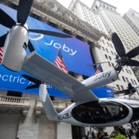 A Joby Aviation Inc. Electric Vertical Take-Off and Landing (eVTOL) aircraft outside the New York Stock Exchange during the company\'s initial public offering on Aug.11, 2021.  | BLOOMBERG