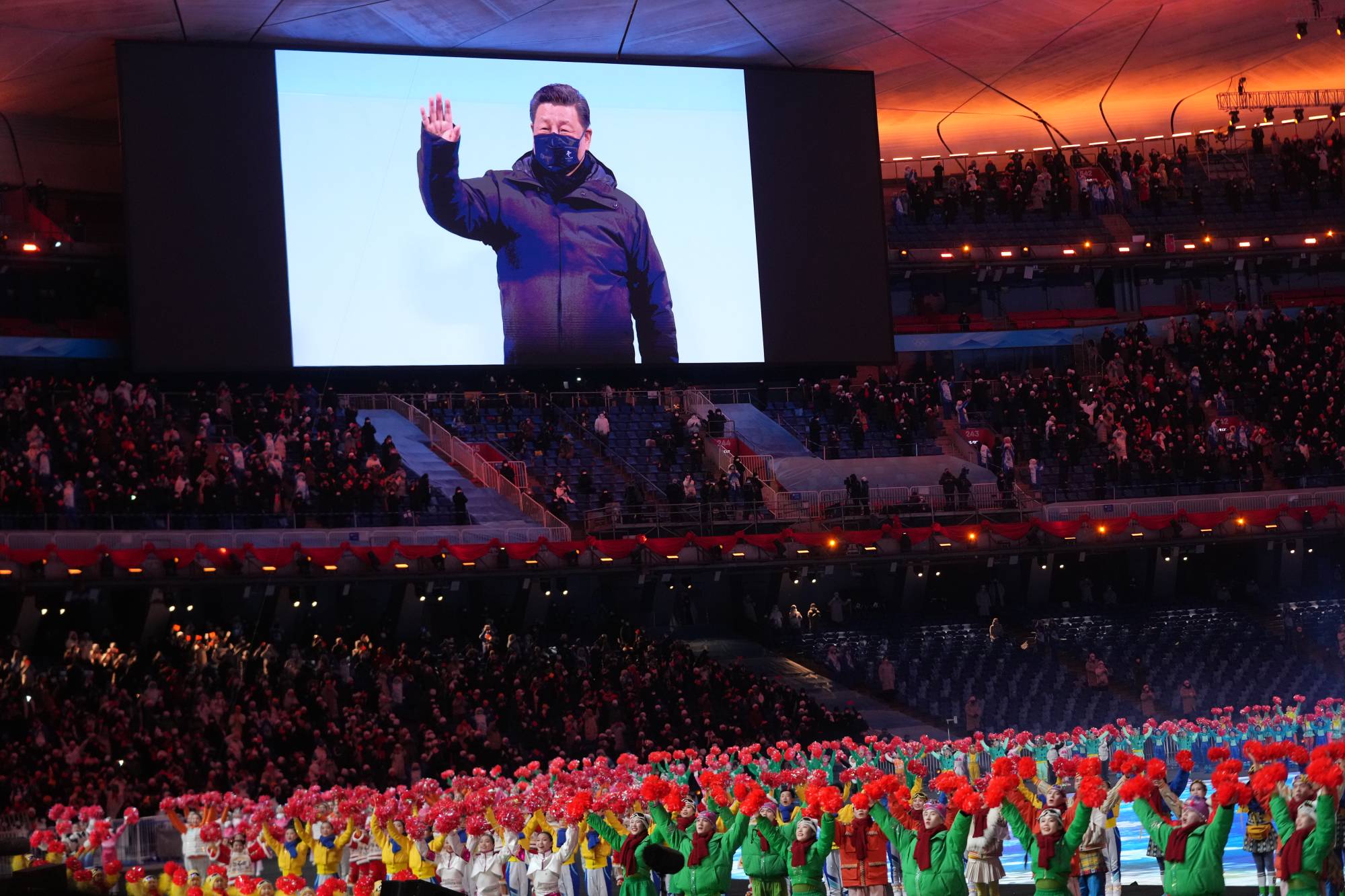 President Xi Jinping of China appears on a screen during the opening ceremony of the 2022 Beijing Olympics in Beijing on Feb. 4. | Gabriela Bhaskar / The New York Times