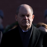 German Chancellor Olaf Scholz attends a wreath-laying ceremony at the Tomb of the Unknown Soldier by the Kremlin Wall in Moscow on Tuesday. |  REUTERS