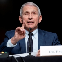Dr. Anthony Fauci, director of the National Institute of Allergy and Infectious Diseases, responds to questions during a Senate Health, Education, Labor, and Pensions Committee hearing to examine the federal response to COVID-19 at Capitol Hill in Washington, on Jan. 11.  | POOL / VIA REUTERS