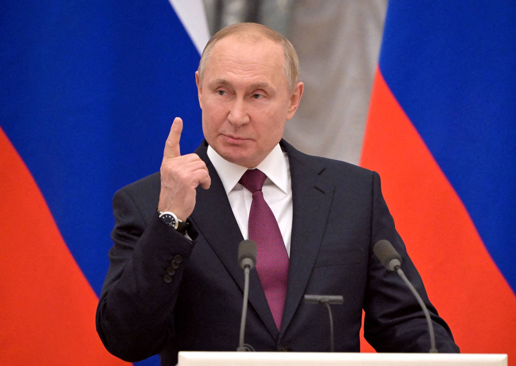 For Russian President Vladimir Putin, a recent procession of foreign dignitaries flying in for talks is a diplomatic win, pushing Moscow's security worries to the top of the world agenda. | SPUTNIK / POOL / VIA REUTERS