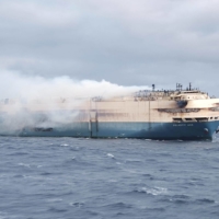 The ship, Felicity Ace, burns off the coast of Portugal\'s Azores islands on Friday.  | PORTUGUESE NAVY / VIA REUTERS 