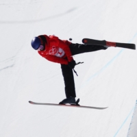 China\'s Eileen Gu competes in the women\'s freeski halfpipe final in Zhangjiakou, China, on Friday. | REUTERS